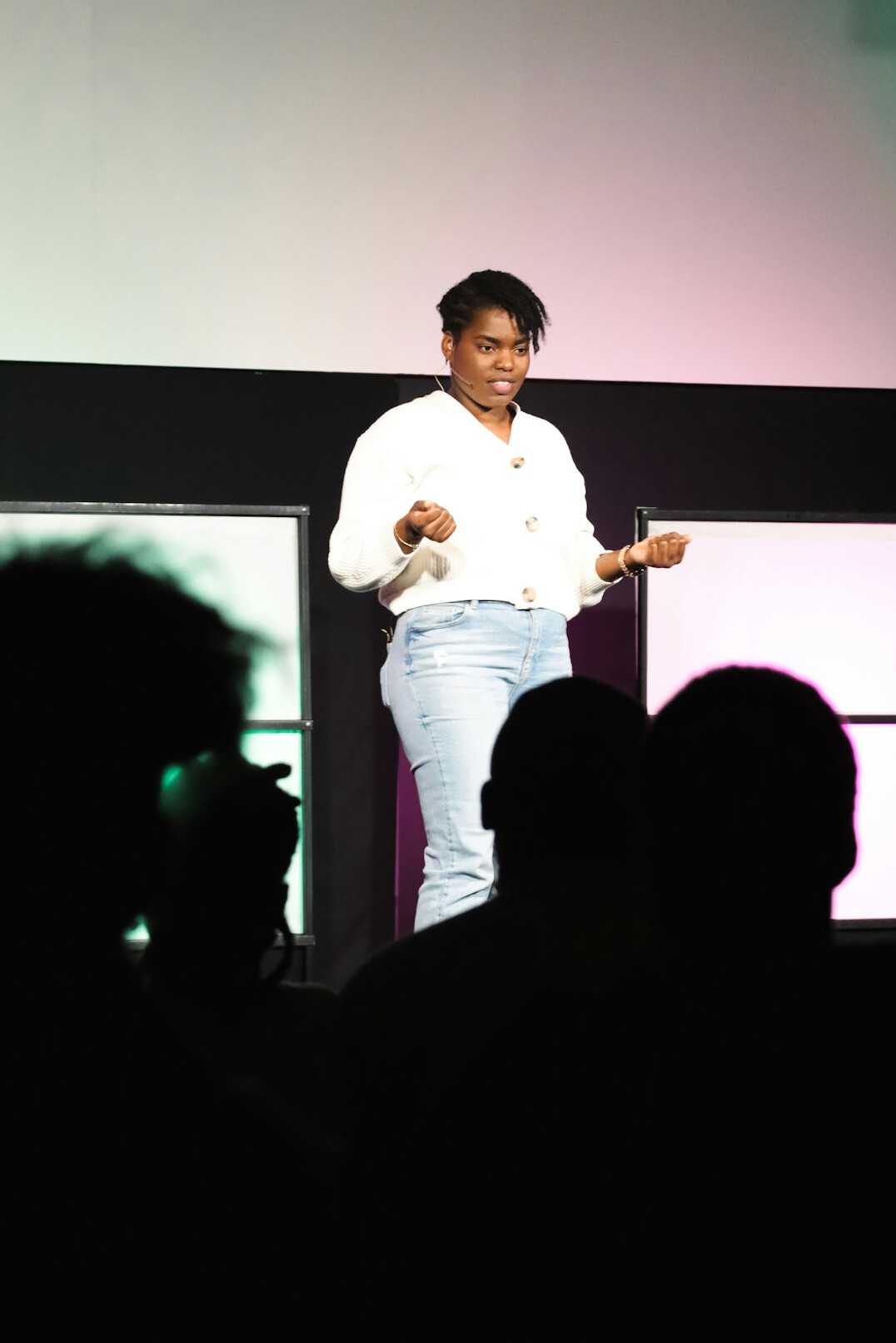 confident speaker on stage