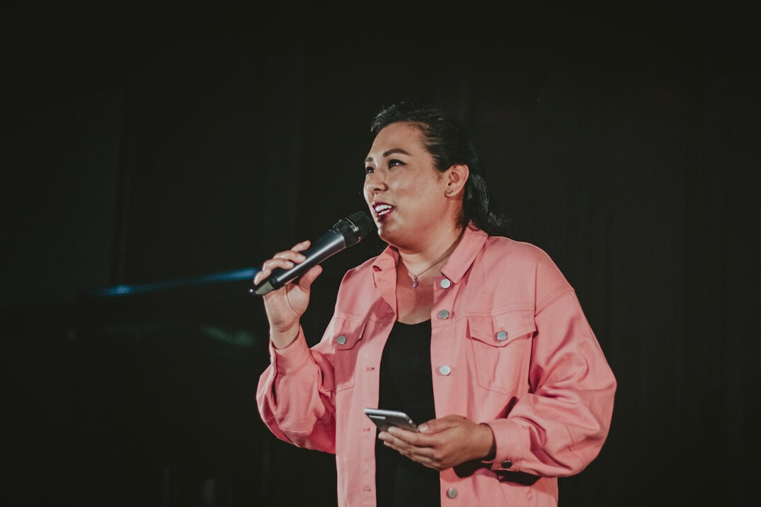 person speaking on stage